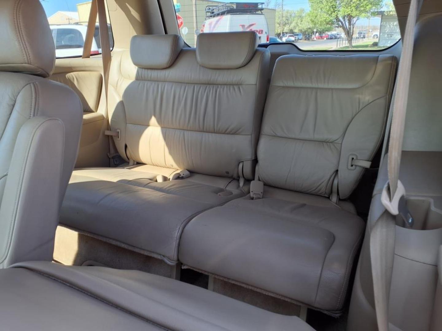 2006 Redrock Pearl Re Honda Odyssey EX-L w/DVD (5FNRL38706B) with an 3.5L 3L NA V6 single overhead cam (SOHC) 24V Fuel Injected engine, 5-Speed Automatic transmission, located at 1401 N. Hobart, Pampa, TX, 79065, (806) 665-9872, 35.549953, -100.975098 - Photo#15