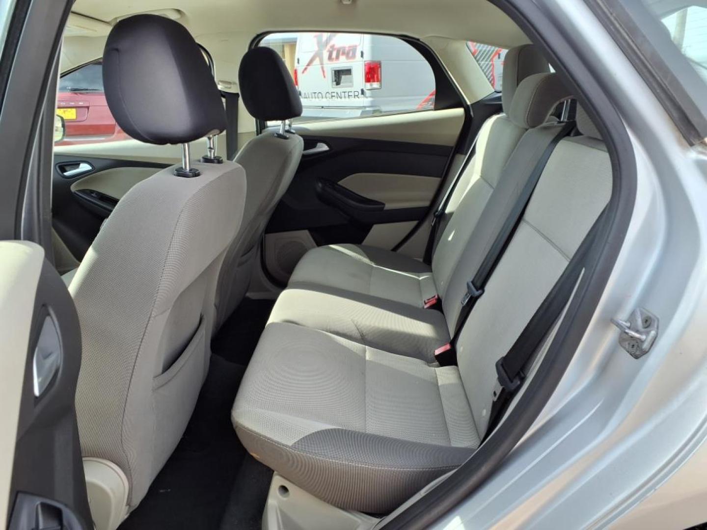 2014 Ingot Silver Metallic Ux Ford Focus SE (1FADP3K28EL) with an 2.0L 2.0L Flex Fuel I4 160hp 146ft. lbs. Fuel Injected engine, 6-Speed Double Clutch transmission, located at 1401 N. Hobart, Pampa, TX, 79065, (806) 665-9872, 35.549953, -100.975098 - Photo#10
