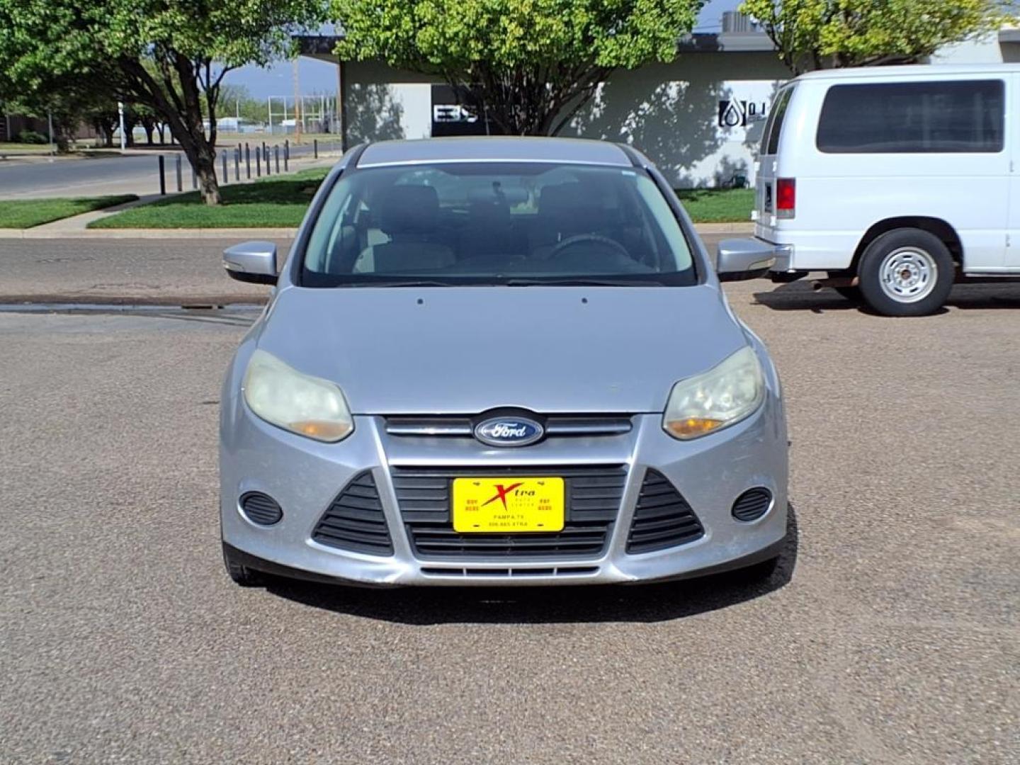 2014 Ingot Silver Metallic Ux Ford Focus SE (1FADP3K28EL) with an 2.0L 2.0L Flex Fuel I4 160hp 146ft. lbs. Fuel Injected engine, 6-Speed Double Clutch transmission, located at 1401 N. Hobart, Pampa, TX, 79065, (806) 665-9872, 35.549953, -100.975098 - Photo#1
