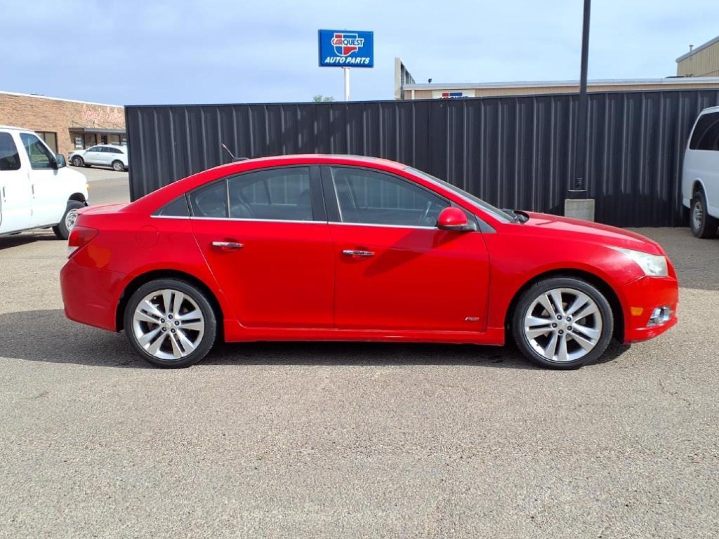 2014 Red Hot G7c Chevrolet Cruze LTZ Auto (1G1PG5SB9E7) with an 1.4L Ecotec 1.4L Turbo I4 138hp 148ft. lbs. Sequential Multiport Fuel Injection engine, 6-Speed Shiftable Automatic transmission, located at 1401 N. Hobart, Pampa, TX, 79065, (806) 665-9872, 35.549953, -100.975098 - Photo#2