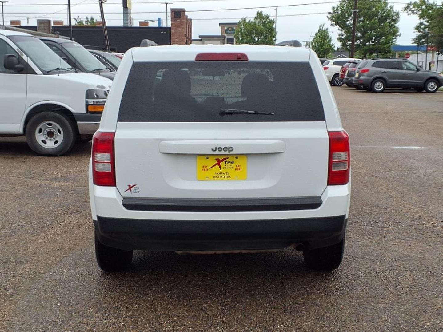 2012 Bright White Clear Coat Pw7 Jeep Patriot Sport (1C4NJPBA2CD) with an 2.0L 2.0L I4 158hp 141ft. lbs. Sequential Multiport Fuel Injection engine, CVT transmission, located at 1401 N. Hobart, Pampa, TX, 79065, (806) 665-9872, 35.549953, -100.975098 - Photo#3