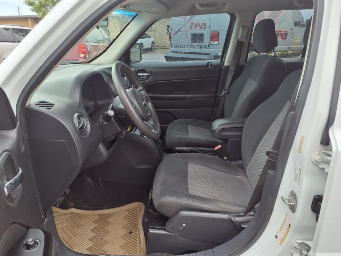 2012 Bright White Clear Coat Pw7 Jeep Patriot Sport (1C4NJPBA2CD) with an 2.0L 2.0L I4 158hp 141ft. lbs. Sequential Multiport Fuel Injection engine, CVT transmission, located at 1401 N. Hobart, Pampa, TX, 79065, (806) 665-9872, 35.549953, -100.975098 - Photo#9