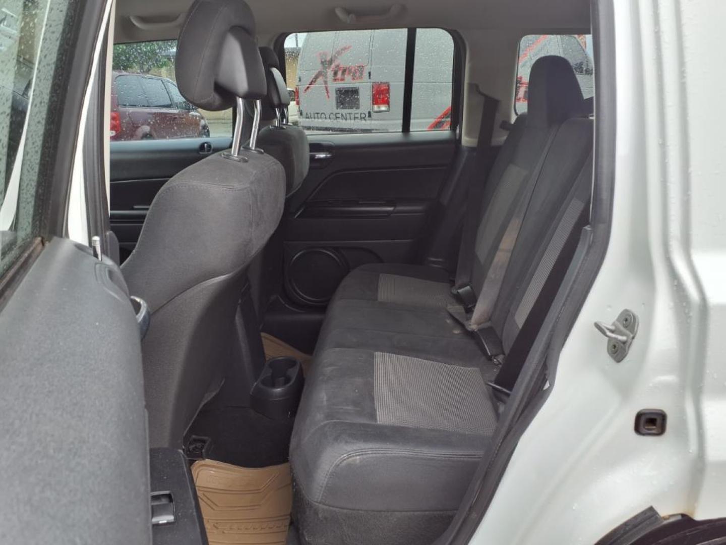 2012 Bright White Clear Coat Pw7 Jeep Patriot Sport (1C4NJPBA2CD) with an 2.0L 2.0L I4 158hp 141ft. lbs. Sequential Multiport Fuel Injection engine, CVT transmission, located at 1401 N. Hobart, Pampa, TX, 79065, (806) 665-9872, 35.549953, -100.975098 - Photo#10