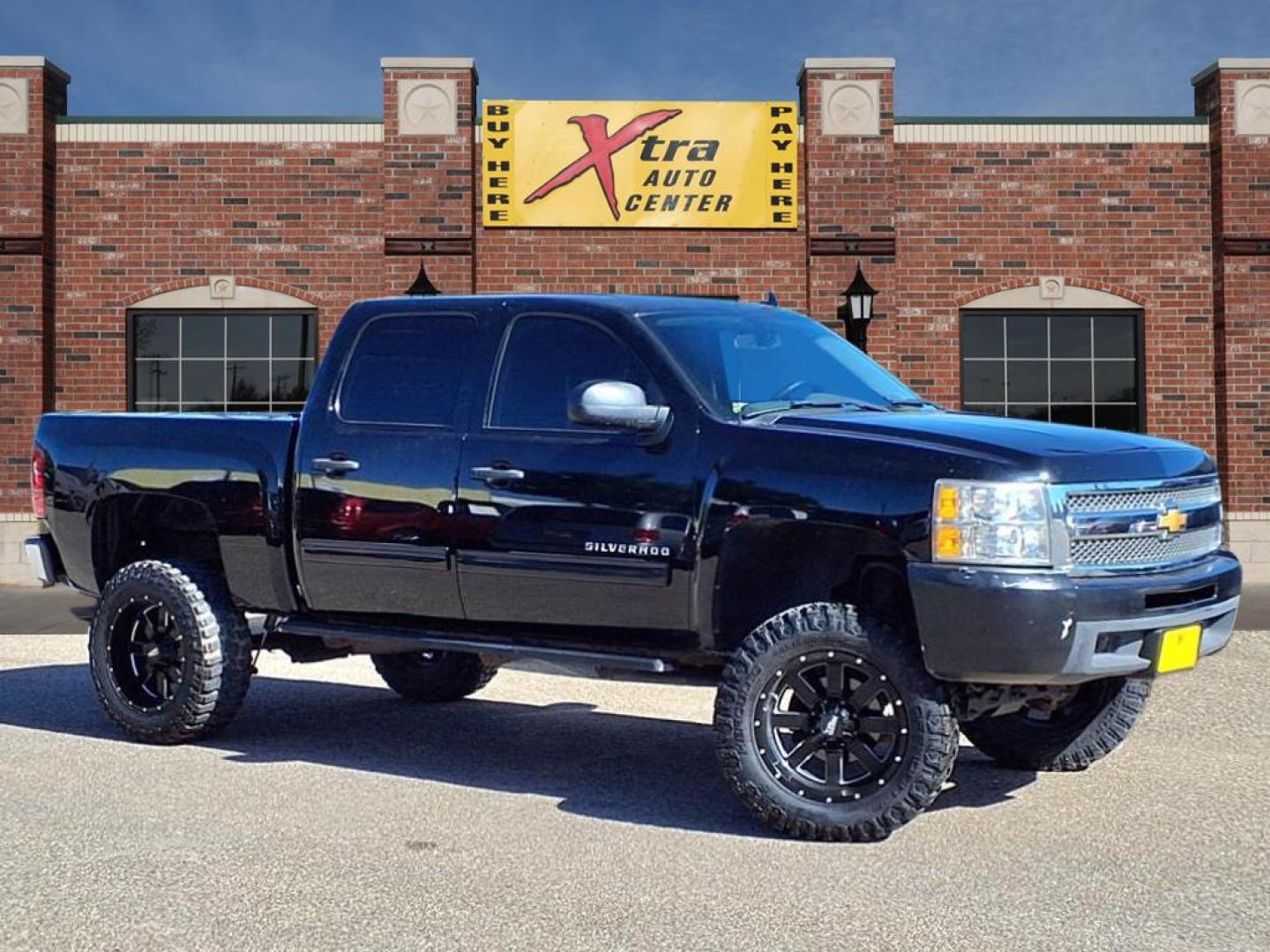2012 Black Chevrolet Silverado 1500 LS (3GCPCREA5CG) with an 4.8L Vortec 4.8L Flex Fuel V8 302hp 305ft. lbs. Sequential-Port F.I. engine, 4-Speed Automatic transmission, located at 1401 N. Hobart, Pampa, TX, 79065, (806) 665-9872, 35.549953, -100.975098 - Photo#0