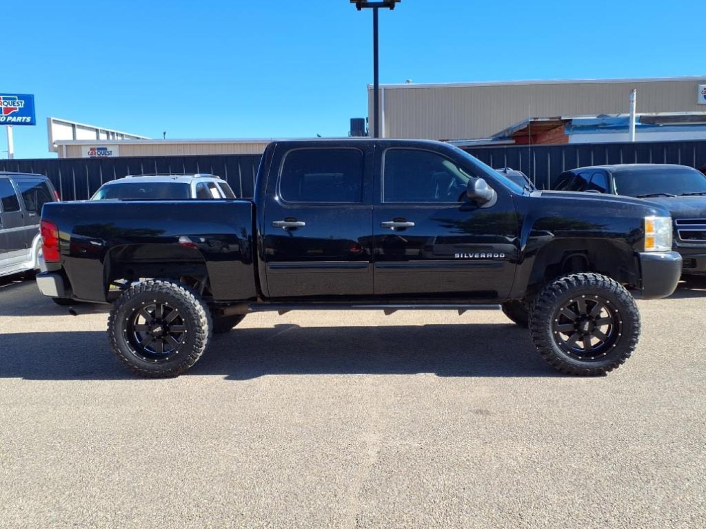 2012 Black Chevrolet Silverado 1500 LS (3GCPCREA5CG) with an 4.8L Vortec 4.8L Flex Fuel V8 302hp 305ft. lbs. Sequential-Port F.I. engine, 4-Speed Automatic transmission, located at 1401 N. Hobart, Pampa, TX, 79065, (806) 665-9872, 35.549953, -100.975098 - Photo#2