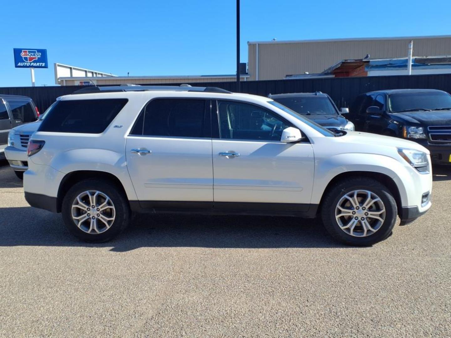 2015 White Diamond Tricoat GMC Acadia SLT-2 (1GKKRSKDXFJ) with an 3.6L 3.6L V6 281hp 266ft. lbs. Direct Injection engine, 6-Speed Shiftable Automatic transmission, located at 1401 N. Hobart, Pampa, TX, 79065, (806) 665-9872, 35.549953, -100.975098 - Photo#2