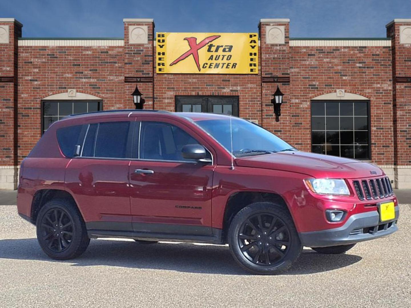 2015 Deep Cherry Red Crystal Pearl Coat Jeep Compass Altitude Edition (1C4NJCBAXFD) with an 2.0L 2.0L I4 158hp 141ft. lbs. Sequential Multiport Fuel Injection engine, CVT transmission, located at 1401 N. Hobart, Pampa, TX, 79065, (806) 665-9872, 35.549953, -100.975098 - Photo#0