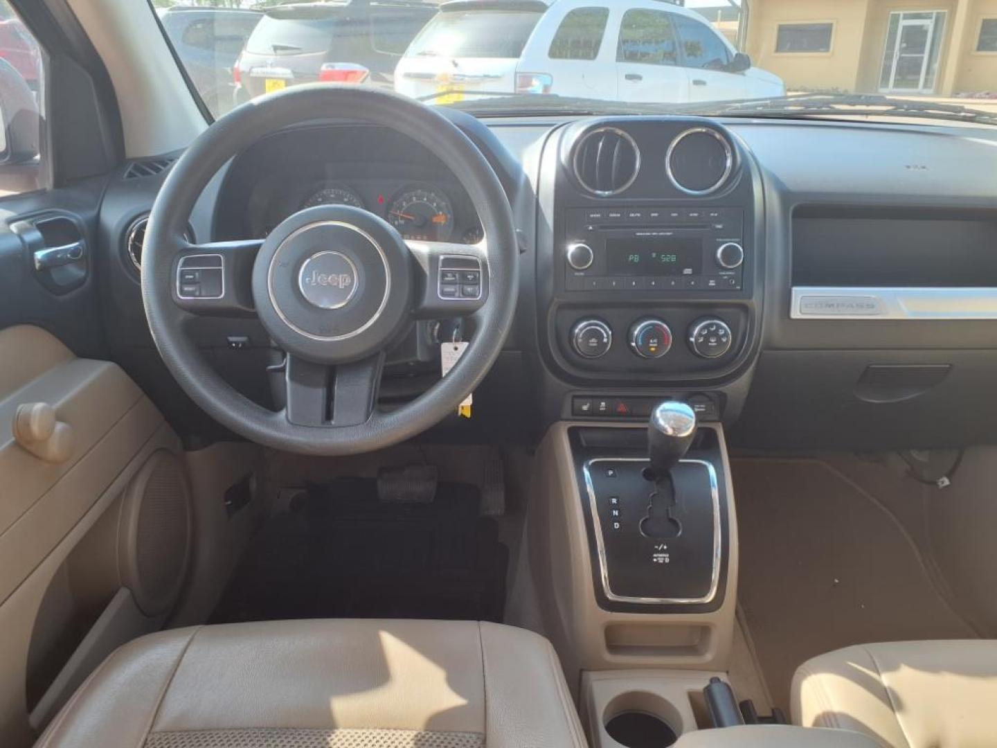 2015 Deep Cherry Red Crystal Pearl Coat Jeep Compass Altitude Edition (1C4NJCBAXFD) with an 2.0L 2.0L I4 158hp 141ft. lbs. Sequential Multiport Fuel Injection engine, CVT transmission, located at 1401 N. Hobart, Pampa, TX, 79065, (806) 665-9872, 35.549953, -100.975098 - Photo#9