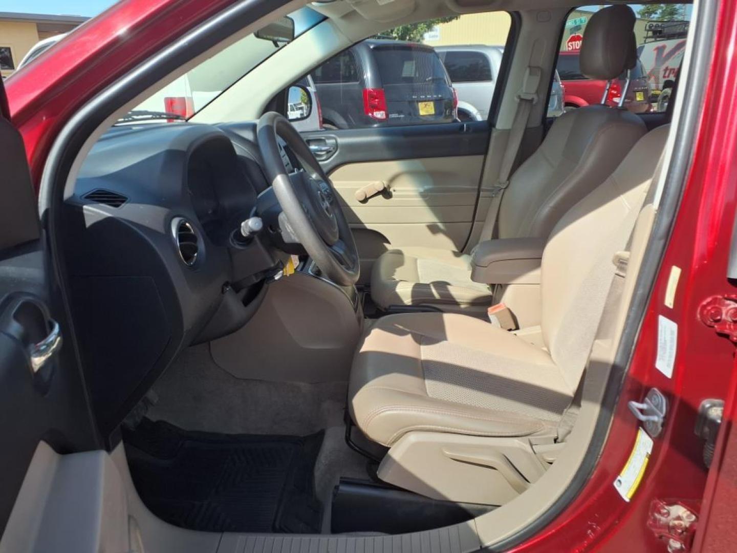 2015 Deep Cherry Red Crystal Pearl Coat Jeep Compass Altitude Edition (1C4NJCBAXFD) with an 2.0L 2.0L I4 158hp 141ft. lbs. Sequential Multiport Fuel Injection engine, CVT transmission, located at 1401 N. Hobart, Pampa, TX, 79065, (806) 665-9872, 35.549953, -100.975098 - Photo#10
