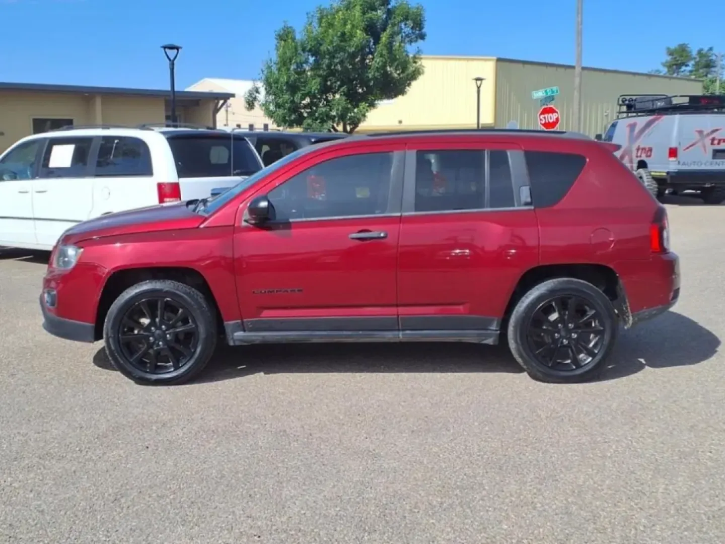 2015 Deep Cherry Red Crystal Pearl Coat Prp Jeep Compass Sport FWD (1C4NJCBAXFD) with an Other engine, CVT transmission, located at 1401 N. Hobart, Pampa, TX, 79065, (806) 665-9872, 35.549953, -100.975098 - **Explore Your Next Adventure with the 2015 Jeep Compass Sport FWD!**<br /> <br /> Are you ready to elevate your weekend adventures or daily commutes? The 2015 Jeep Compass Sport FWD is the perfect companion for those looking to embrace a versatile lifestyle without breaking the bank. Whether you're - Photo#4