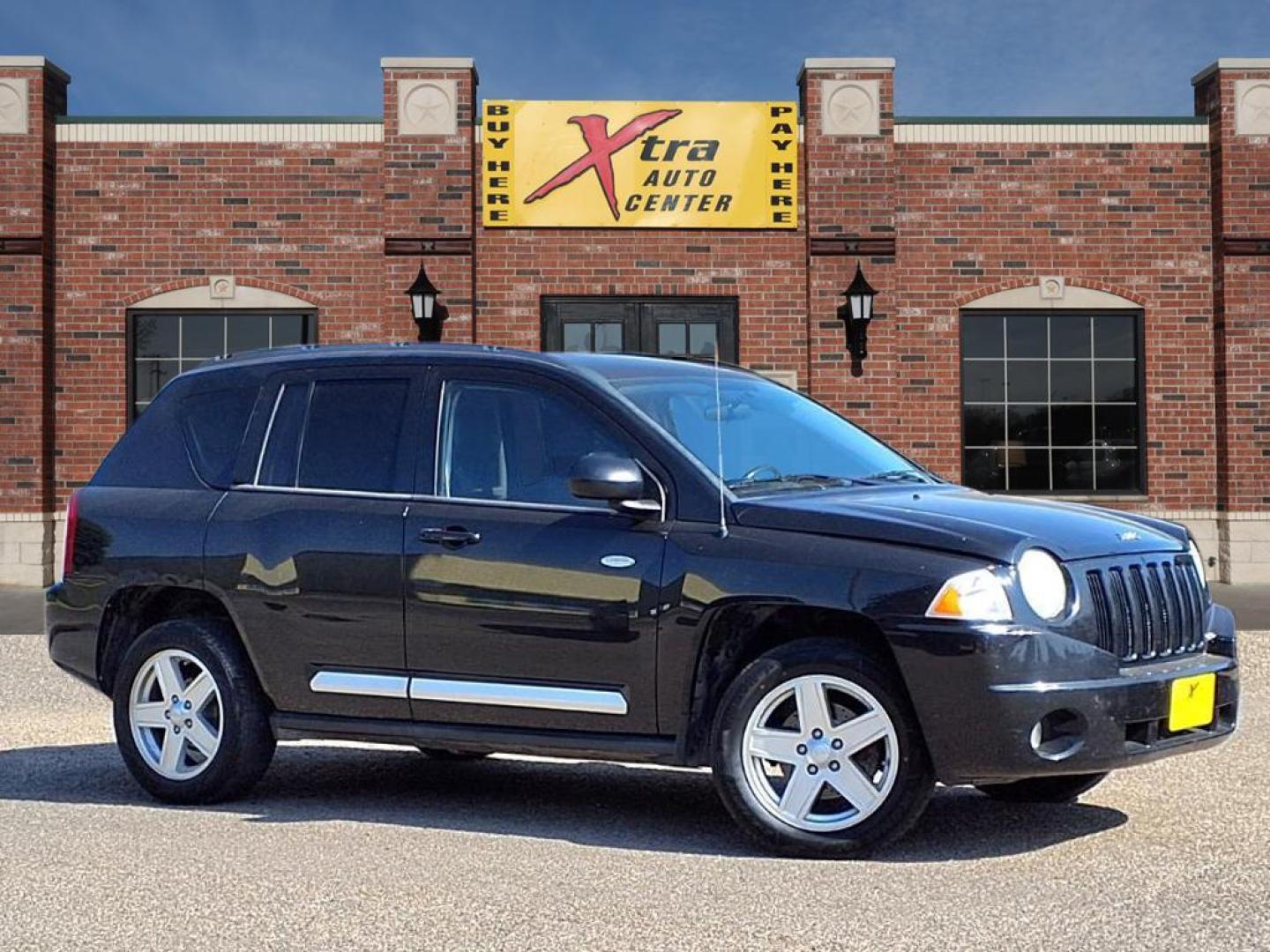 2010 Brilliant Black Crystal Pearl Coat Jeep Compass Latitude (1J4NF1FB2AD) with an 2.4L 2.4L I4 172hp 165ft. lbs. Sequential Multiport Fuel Injection engine, CVT transmission, located at 1401 N. Hobart, Pampa, TX, 79065, (806) 665-9872, 35.549953, -100.975098 - Photo#0