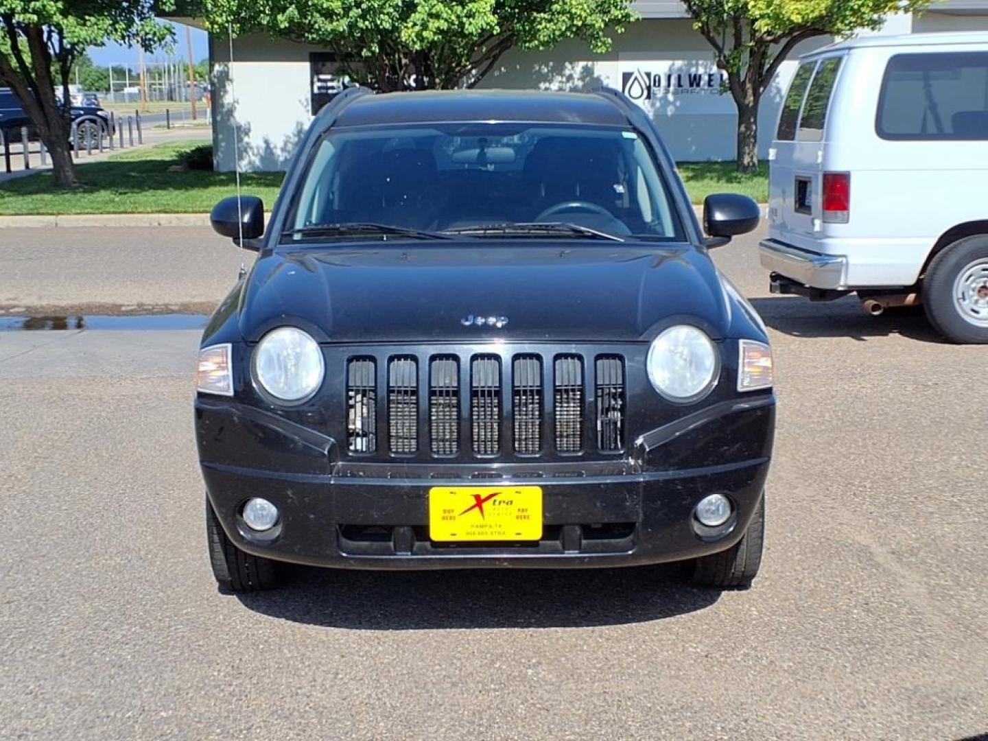 2010 Brilliant Black Crystal Pearl Coat Jeep Compass Latitude (1J4NF1FB2AD) with an 2.4L 2.4L I4 172hp 165ft. lbs. Sequential Multiport Fuel Injection engine, CVT transmission, located at 1401 N. Hobart, Pampa, TX, 79065, (806) 665-9872, 35.549953, -100.975098 - Photo#1