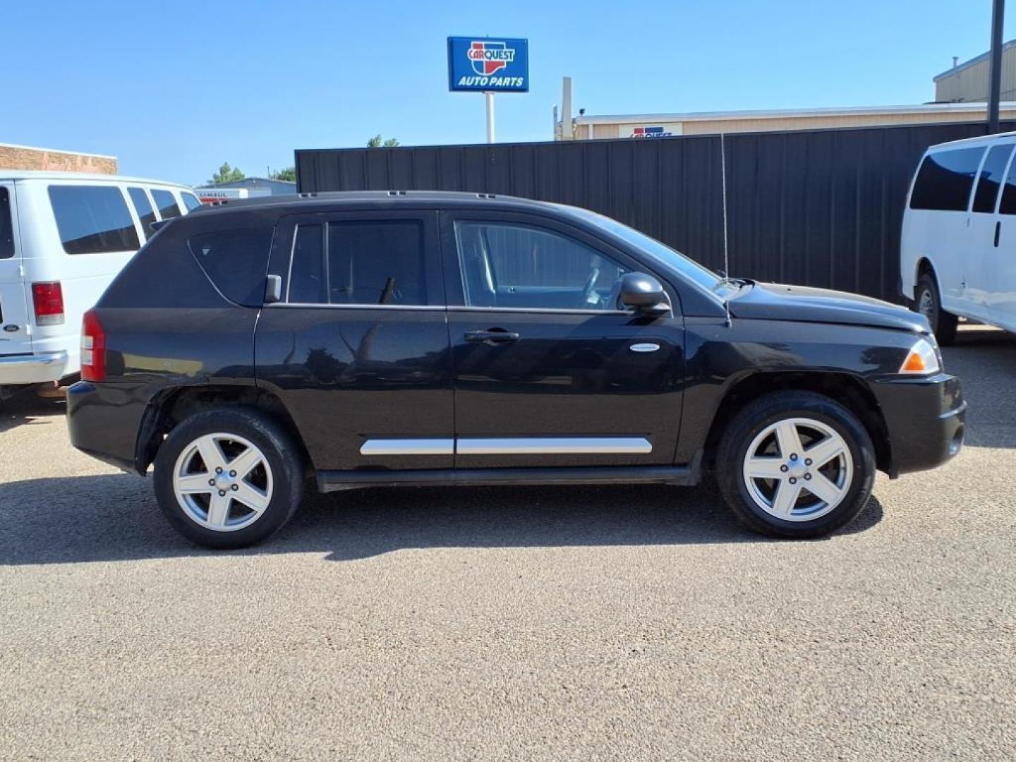 2010 Brilliant Black Crystal Pearl Coat Jeep Compass Latitude (1J4NF1FB2AD) with an 2.4L 2.4L I4 172hp 165ft. lbs. Sequential Multiport Fuel Injection engine, CVT transmission, located at 1401 N. Hobart, Pampa, TX, 79065, (806) 665-9872, 35.549953, -100.975098 - Photo#2
