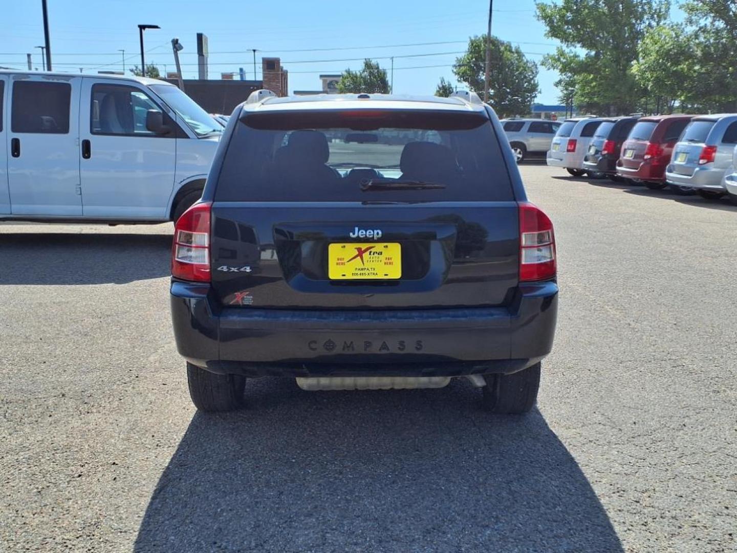 2010 Brilliant Black Crystal Pearl Coat Jeep Compass Latitude (1J4NF1FB2AD) with an 2.4L 2.4L I4 172hp 165ft. lbs. Sequential Multiport Fuel Injection engine, CVT transmission, located at 1401 N. Hobart, Pampa, TX, 79065, (806) 665-9872, 35.549953, -100.975098 - Photo#3