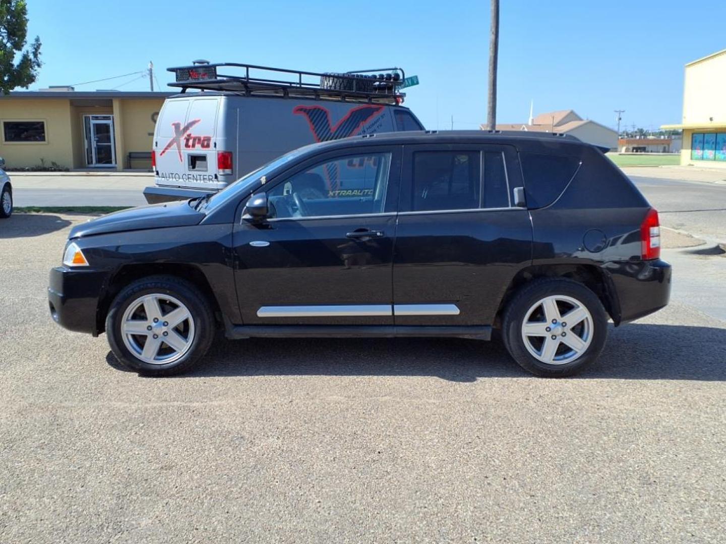 2010 Brilliant Black Crystal Pearl Coat Jeep Compass Latitude (1J4NF1FB2AD) with an 2.4L 2.4L I4 172hp 165ft. lbs. Sequential Multiport Fuel Injection engine, CVT transmission, located at 1401 N. Hobart, Pampa, TX, 79065, (806) 665-9872, 35.549953, -100.975098 - Photo#4