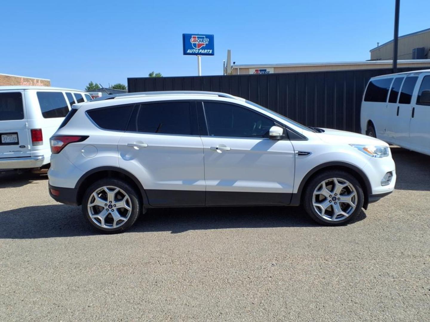 2018 White Platinum Metallic Tri-Coat Ford Escape Titanium (1FMCU9J96JU) with an 2.0L EcoBoost 2.0L Turbo I4 245hp 275ft. lbs. Direct Injection engine, 6-Speed Shiftable Automatic transmission, located at 1401 N. Hobart, Pampa, TX, 79065, (806) 665-9872, 35.549953, -100.975098 - Photo#2