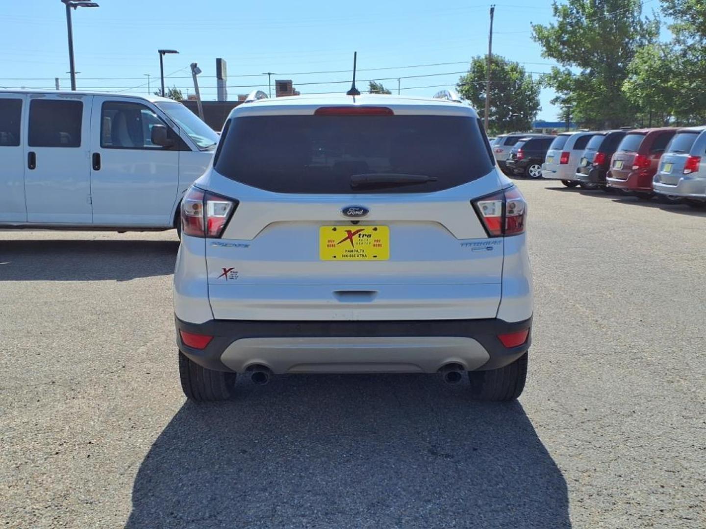 2018 White Platinum Metallic Tri-Coat Ford Escape Titanium (1FMCU9J96JU) with an 2.0L EcoBoost 2.0L Turbo I4 245hp 275ft. lbs. Direct Injection engine, 6-Speed Shiftable Automatic transmission, located at 1401 N. Hobart, Pampa, TX, 79065, (806) 665-9872, 35.549953, -100.975098 - Photo#3