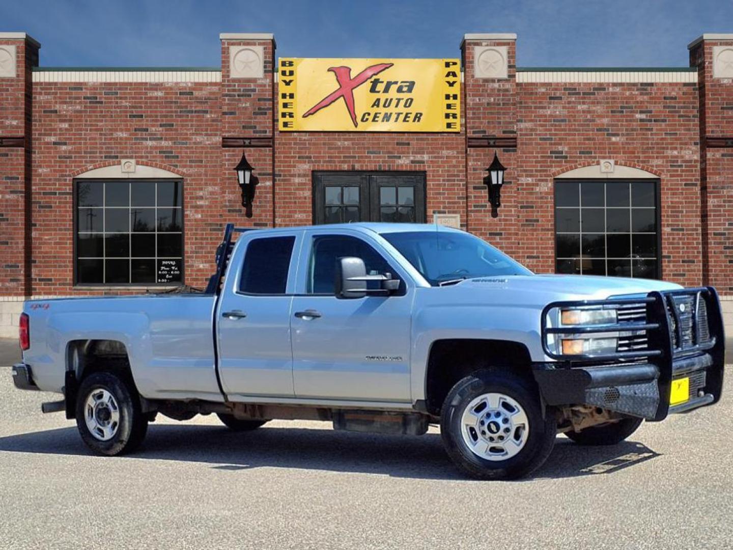 2015 Silver Ice Metallic Gan Chevrolet Silverado 2500HD Work Truck (1GC2KUE83FZ) with an 6.6L Duramax 6.6L Diesel Turbo V8 397hp 765ft. lbs. Common Rail Direct Injection engine, Allison 1000 6-Speed Shiftable Automatic transmission, located at 1401 N. Hobart, Pampa, TX, 79065, (806) 665-9872, 35.549953, -100.975098 - Photo#0
