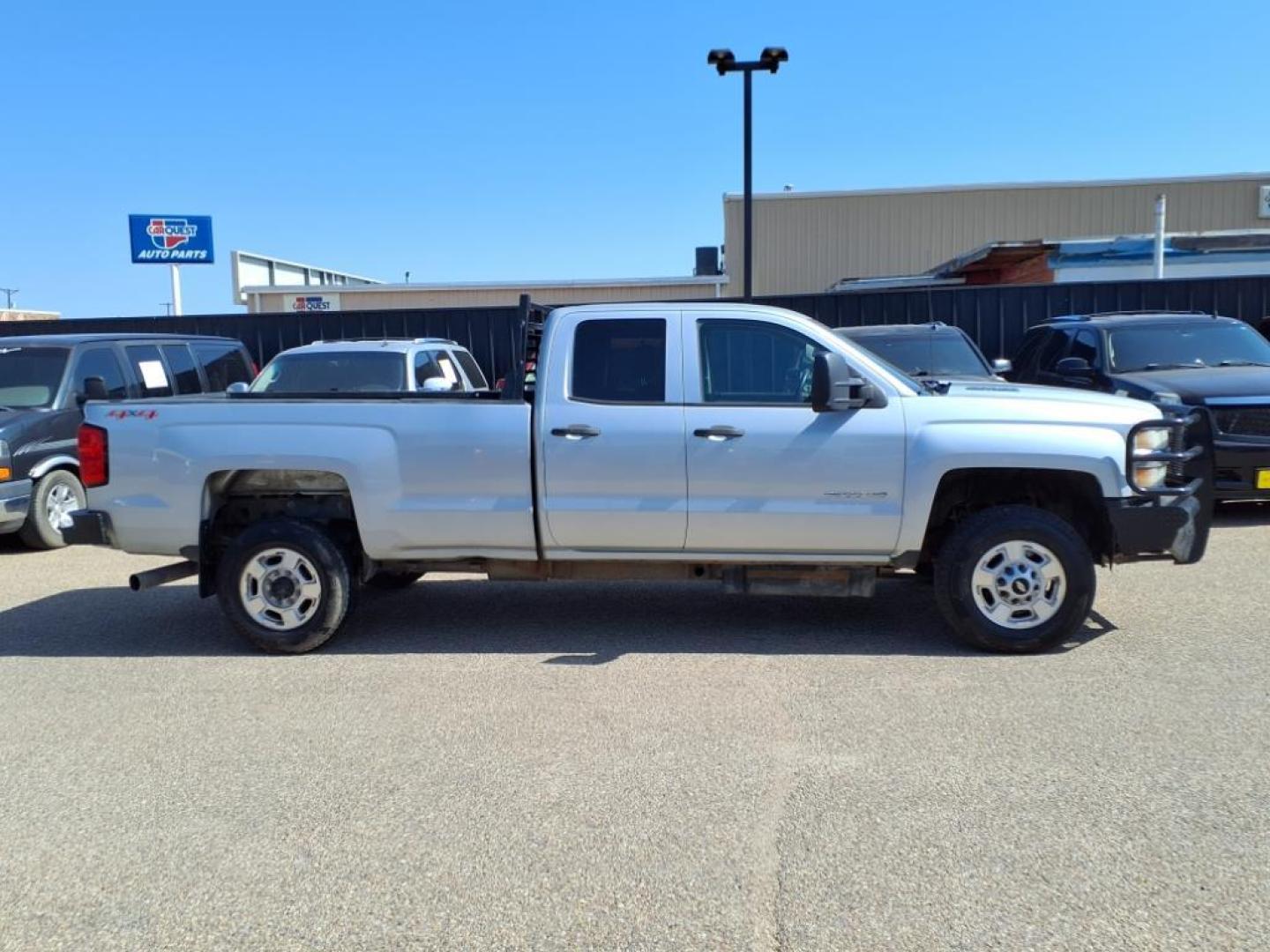 2015 Silver Ice Metallic Gan Chevrolet Silverado 2500HD Work Truck (1GC2KUE83FZ) with an 6.6L Duramax 6.6L Diesel Turbo V8 397hp 765ft. lbs. Common Rail Direct Injection engine, Allison 1000 6-Speed Shiftable Automatic transmission, located at 1401 N. Hobart, Pampa, TX, 79065, (806) 665-9872, 35.549953, -100.975098 - Photo#2