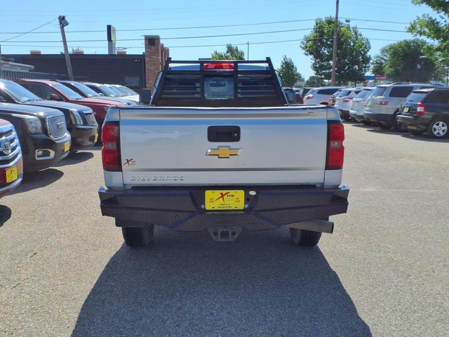 2015 Silver Ice Metallic Gan Chevrolet Silverado 2500HD Work Truck (1GC2KUE83FZ) with an 6.6L Duramax 6.6L Diesel Turbo V8 397hp 765ft. lbs. Common Rail Direct Injection engine, Allison 1000 6-Speed Shiftable Automatic transmission, located at 1401 N. Hobart, Pampa, TX, 79065, (806) 665-9872, 35.549953, -100.975098 - Photo#3