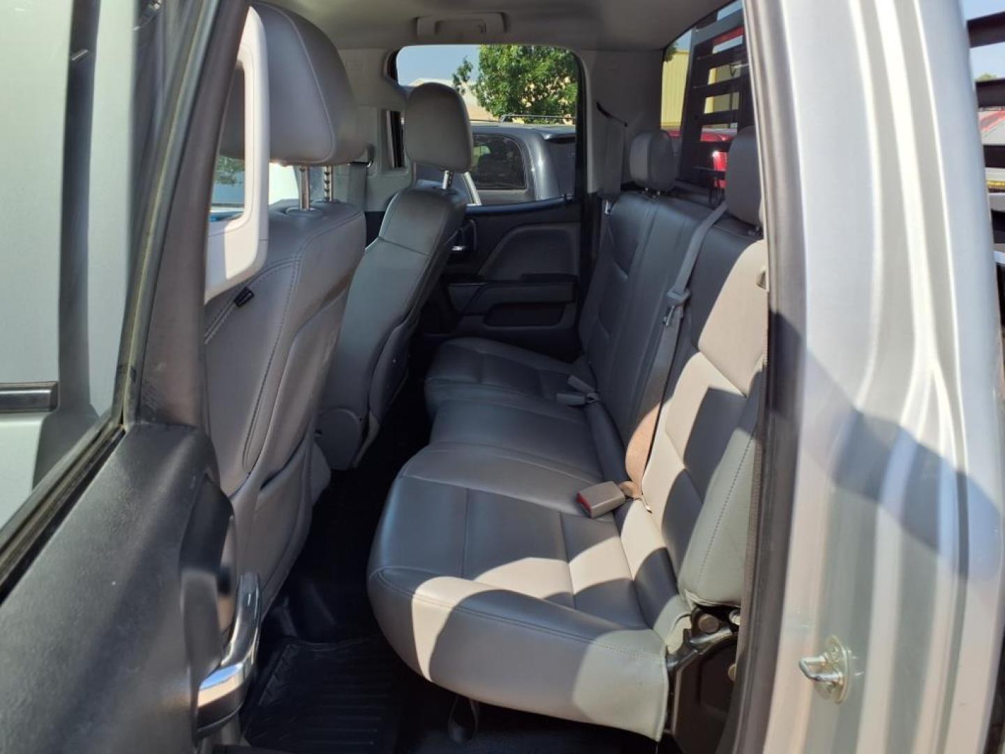 2015 Silver Ice Metallic Gan Chevrolet Silverado 2500HD Work Truck (1GC2KUE83FZ) with an 6.6L Duramax 6.6L Diesel Turbo V8 397hp 765ft. lbs. Common Rail Direct Injection engine, Allison 1000 6-Speed Shiftable Automatic transmission, located at 1401 N. Hobart, Pampa, TX, 79065, (806) 665-9872, 35.549953, -100.975098 - Photo#12