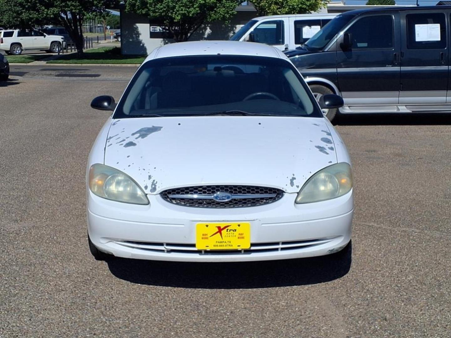 2003 Vibrant White Clearcoat Ford Taurus LX (1FAFP52U63G) with an 3.0L 3.0L NA V6 overhead valves (OHV) 12V Fuel Injected engine, 4-Speed Automatic transmission, located at 1401 N. Hobart, Pampa, TX, 79065, (806) 665-9872, 35.549953, -100.975098 - Photo#1