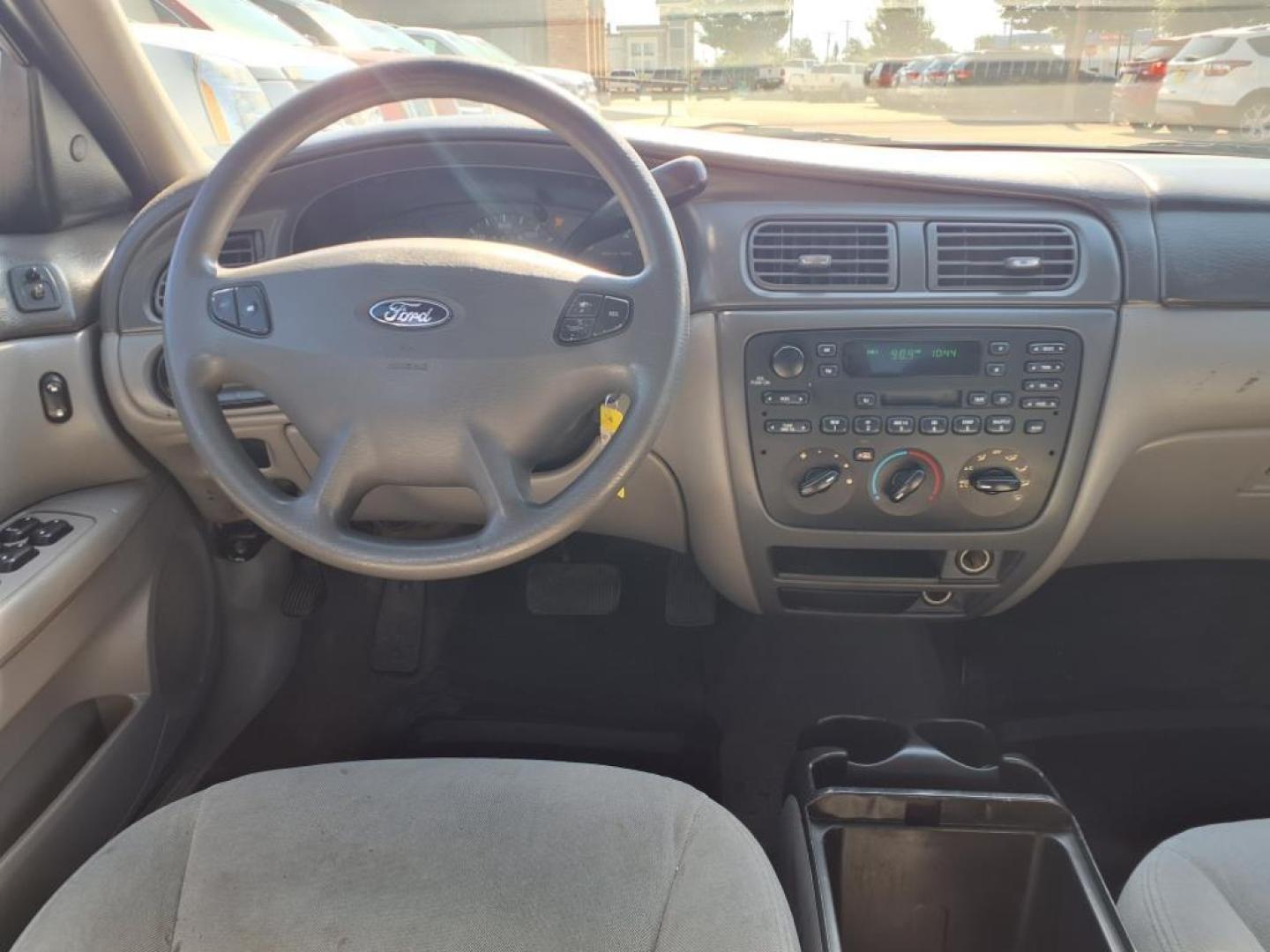 2003 Vibrant White Clearcoat Ford Taurus LX (1FAFP52U63G) with an 3.0L 3.0L NA V6 overhead valves (OHV) 12V Fuel Injected engine, 4-Speed Automatic transmission, located at 1401 N. Hobart, Pampa, TX, 79065, (806) 665-9872, 35.549953, -100.975098 - Photo#8