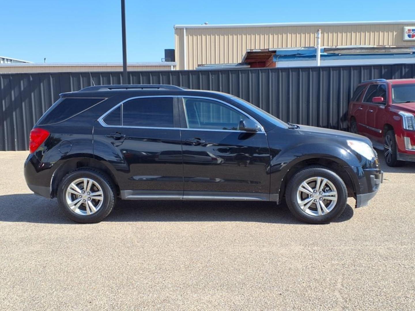 2010 Black Chevrolet Equinox LT (2CNALDEW5A6) with an 2.4L 2.4L I4 182hp 172ft. lbs. Sequential Electronic Fuel Injection engine, 6-Speed Shiftable Automatic transmission, located at 1401 N. Hobart, Pampa, TX, 79065, (806) 665-9872, 35.549953, -100.975098 - Photo#2