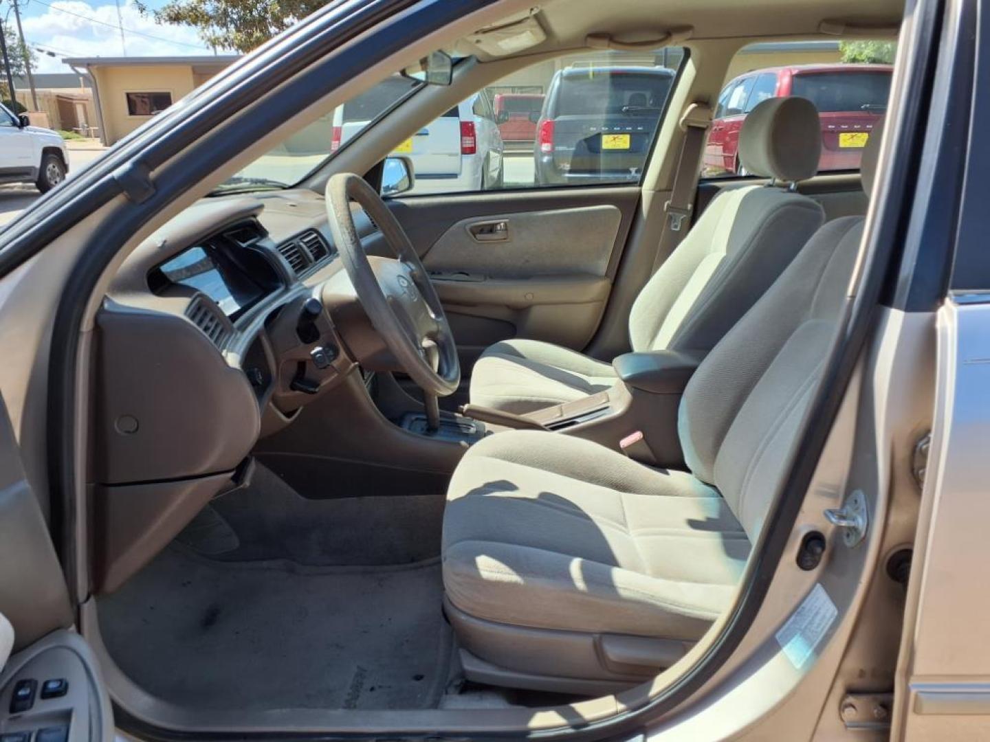 1999 Cashmere Beige Metallic Toyota Camry CE (4T1BG22KXXU) with an 2.2L 2L NA I4 double overhead cam (DOHC) 16V Fuel Injected engine, Automatic transmission, located at 1401 N. Hobart, Pampa, TX, 79065, (806) 665-9872, 35.549953, -100.975098 - Photo#10