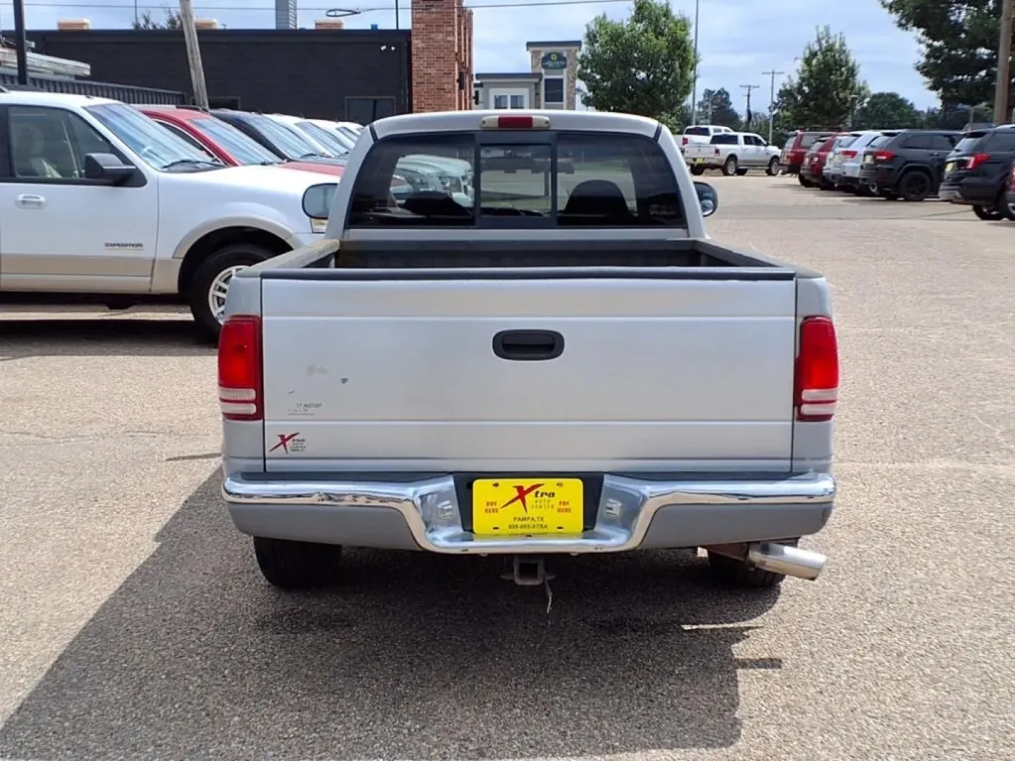 1999 Silver Dodge DAKOTA (1B7GL22X5XS) with an 3.9L engine, Automatic transmission, located at 1401 N. Hobart, Pampa, TX, 79065, (806) 665-9872, 35.549953, -100.975098 - **Rugged Yet Reliable: Discover the 1999 Dodge Dakota at Xtra Auto Center in Pampa, TX!**<br /> <br /> Are you an adventurous soul looking for the perfect pickup to accompany you on all your weekend escapades? Or perhaps you need a dependable vehicle that can handle your daily commute while providin - Photo#3