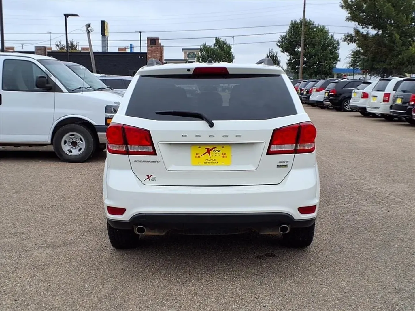 2016 White Dodge Journey SXT (3C4PDCBG0GT) with an Other engine, located at 1401 N. Hobart, Pampa, TX, 79065, (806) 665-9872, 35.549953, -100.975098 - **Adventure Awaits with the 2016 Dodge Journey SXT at Xtra Auto Center!** <br /> <br /> Are you ready to elevate your family's journey? Whether it's a weekend getaway, a daily commute, or just running errands around Pampa, TX, the 2016 Dodge Journey SXT is the perfect sport utility vehicle (SUV) f - Photo#3