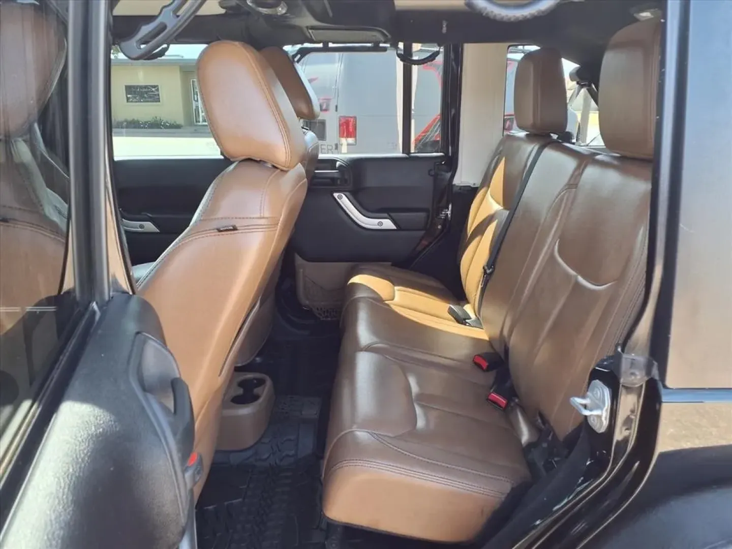 2015 Black Clear Coat Jeep Wrangler Unlimited Sahara 4WD (1C4HJWEG3FL) with an Other engine, Automatic transmission, located at 1401 N. Hobart, Pampa, TX, 79065, (806) 665-9872, 35.549953, -100.975098 - ### Adventure Awaits with the 2015 Jeep Wrangler Unlimited Sahara 4WD<br /> <br /> Are you ready to elevate your lifestyle and explore the open roads? If you're seeking a versatile vehicle that perfectly blends rugged performance with everyday comfort, look no further than this **2015 Jeep Wrangler - Photo#12