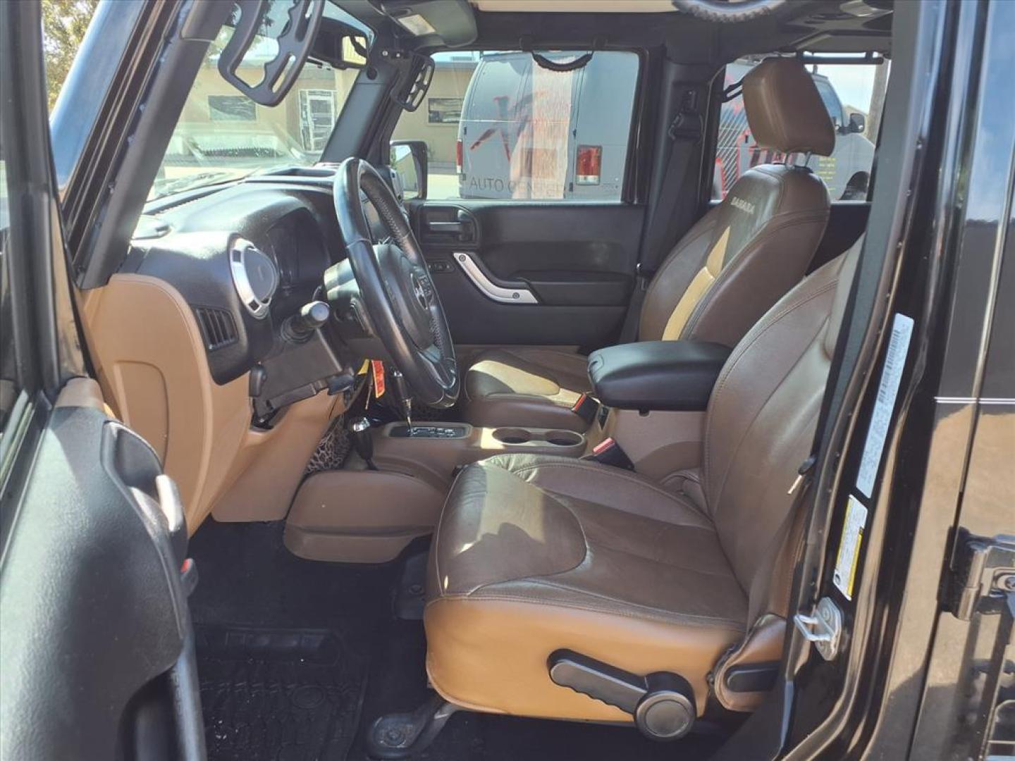 2015 Black Clear Coat Jeep Wrangler Unlimited Sahara (1C4HJWEG3FL) with an 3.6L 3.6L V6 285hp 260ft. lbs. Sequential Multiport Fuel Injection engine, 5-Speed Automatic transmission, located at 1401 N. Hobart, Pampa, TX, 79065, (806) 665-9872, 35.549953, -100.975098 - Photo#11