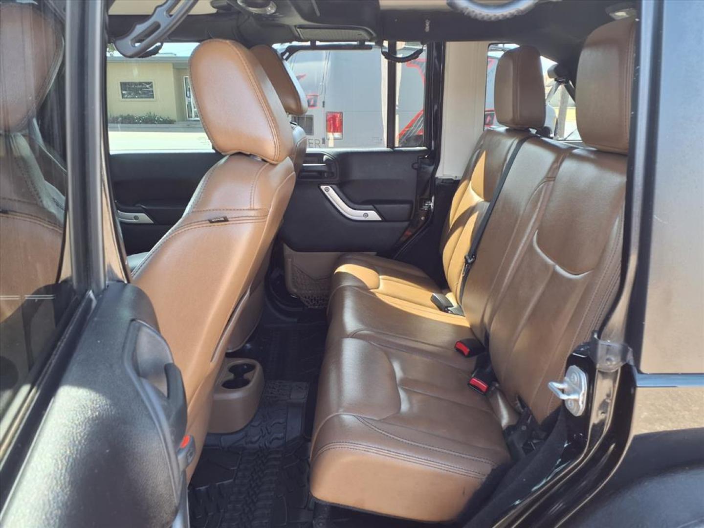 2015 Black Clear Coat Jeep Wrangler Unlimited Sahara (1C4HJWEG3FL) with an 3.6L 3.6L V6 285hp 260ft. lbs. Sequential Multiport Fuel Injection engine, 5-Speed Automatic transmission, located at 1401 N. Hobart, Pampa, TX, 79065, (806) 665-9872, 35.549953, -100.975098 - Photo#12