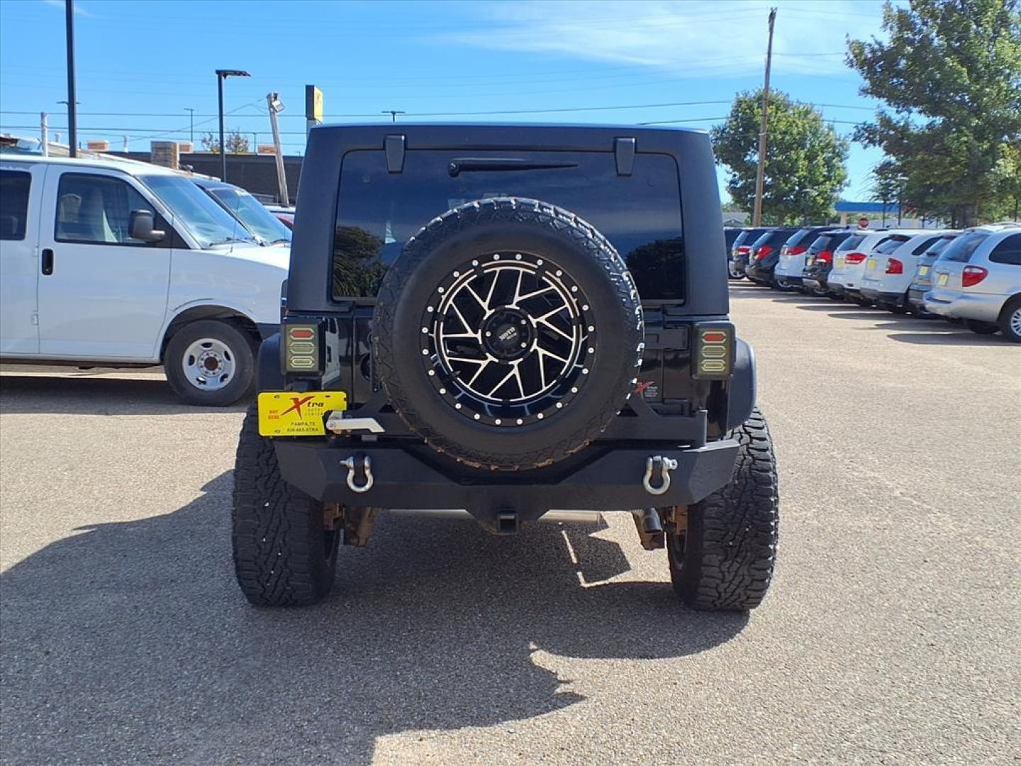 2015 Black Clear Coat Jeep Wrangler Unlimited Sahara (1C4HJWEG3FL) with an 3.6L 3.6L V6 285hp 260ft. lbs. Sequential Multiport Fuel Injection engine, 5-Speed Automatic transmission, located at 1401 N. Hobart, Pampa, TX, 79065, (806) 665-9872, 35.549953, -100.975098 - Photo#3