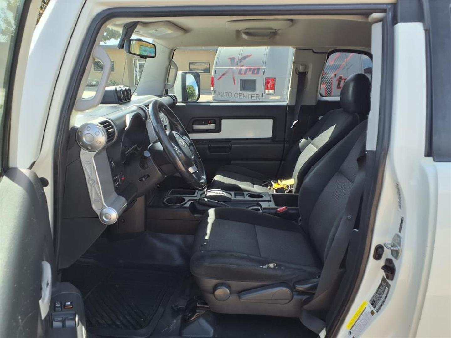 2011 Ice Berg Toyota FJ Cruiser Base (JTEZU4BFXBK) with an 4.0L 4.0L V6 260hp 271ft. lbs. Fuel Injected engine, 5-Speed Automatic transmission, located at 1401 N. Hobart, Pampa, TX, 79065, (806) 665-9872, 35.549953, -100.975098 - Photo#13