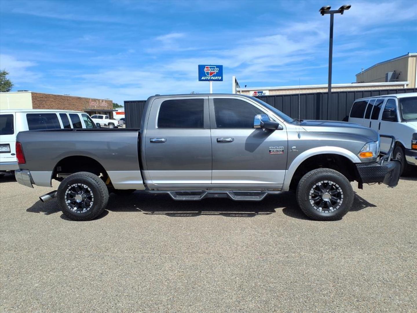 2012 Mineral Gray Metallic Clear Coat/Bright Silver Met RAM 2500 Laramie (3C6UD5FL0CG) with an 6.7L Cummins 6.7L Diesel Turbo I6 350hp 650ft. lbs. Common Rail Direct Injection engine, 6-Speed Shiftable Automatic transmission, located at 1401 N. Hobart, Pampa, TX, 79065, (806) 665-9872, 35.549953, -100.975098 - Photo#2