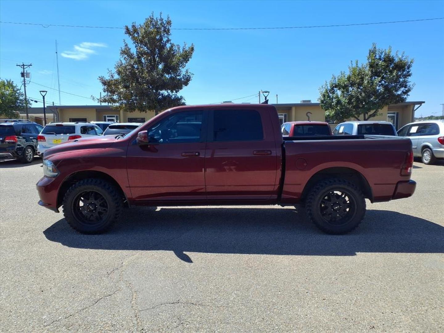2016 Delmonico Red Pearl Coat RAM 1500 Sport (1C6RR7MT6GS) with an 5.7L HEMI 5.7L V8 395hp 410ft. lbs. Sequential Multiport Fuel Injection engine, 8-Speed Shiftable Automatic transmission, located at 1401 N. Hobart, Pampa, TX, 79065, (806) 665-9872, 35.549953, -100.975098 - Photo#4