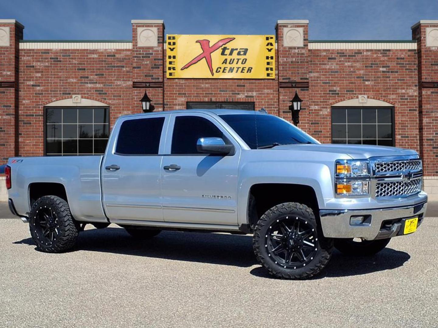 2014 Silver Ice Metallic Chevrolet Silverado 1500 LT Z71 (3GCUKRECXEG) with an 5.3L EcoTec3 5.3L Flex Fuel V8 355hp 383ft. lbs. Direct Injection engine, 6-Speed Shiftable Automatic w/Overdrive transmission, located at 1401 N. Hobart, Pampa, TX, 79065, (806) 665-9872, 35.549953, -100.975098 - Photo#0