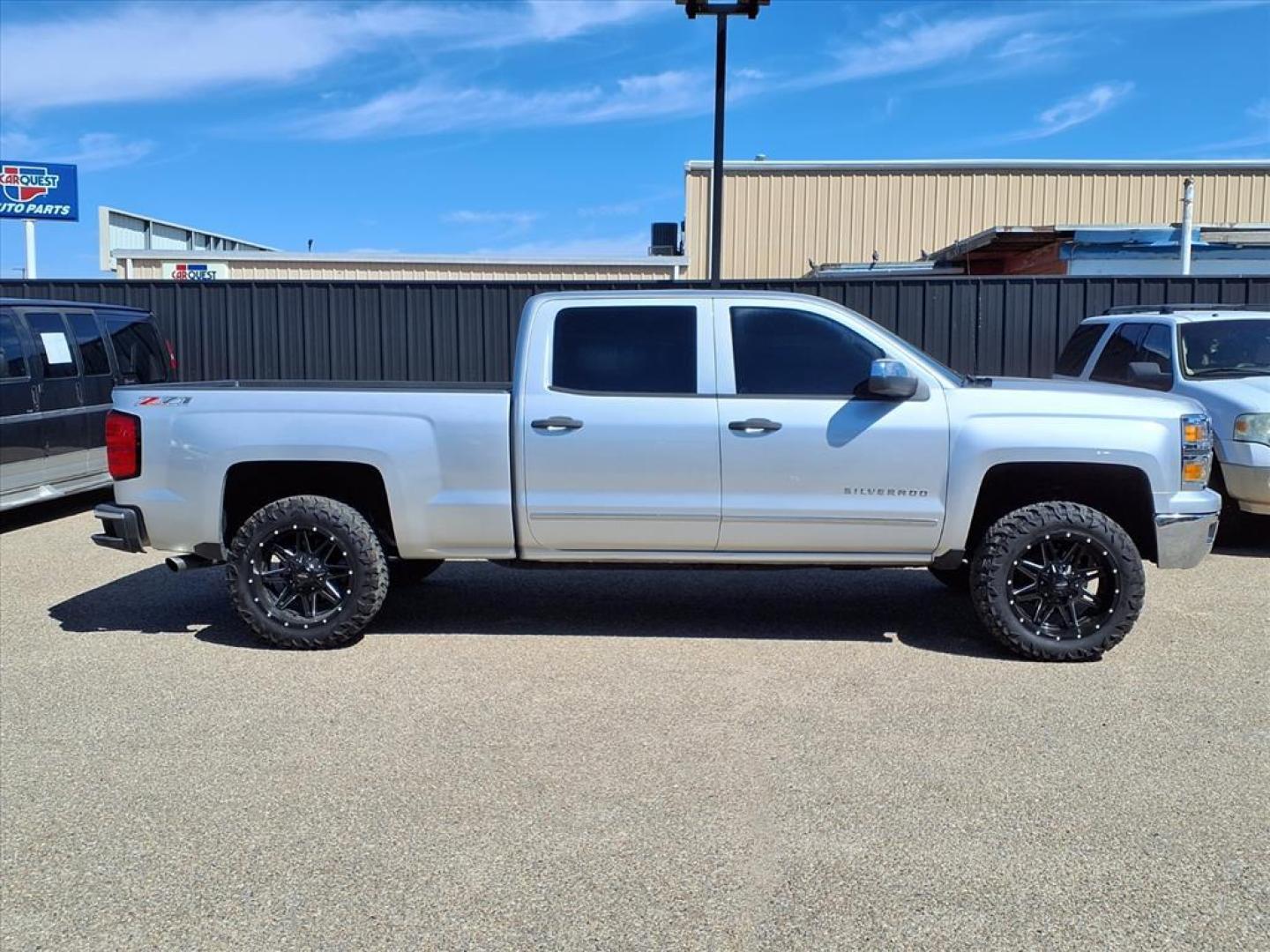 2014 Silver Ice Metallic Chevrolet Silverado 1500 LT Z71 (3GCUKRECXEG) with an 5.3L EcoTec3 5.3L Flex Fuel V8 355hp 383ft. lbs. Direct Injection engine, 6-Speed Shiftable Automatic w/Overdrive transmission, located at 1401 N. Hobart, Pampa, TX, 79065, (806) 665-9872, 35.549953, -100.975098 - Photo#2