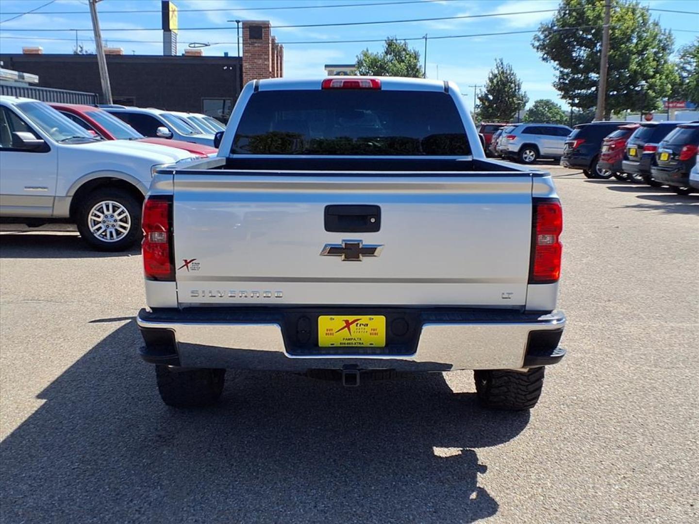 2014 Silver Ice Metallic Chevrolet Silverado 1500 LT Z71 (3GCUKRECXEG) with an 5.3L EcoTec3 5.3L Flex Fuel V8 355hp 383ft. lbs. Direct Injection engine, 6-Speed Shiftable Automatic w/Overdrive transmission, located at 1401 N. Hobart, Pampa, TX, 79065, (806) 665-9872, 35.549953, -100.975098 - Photo#3