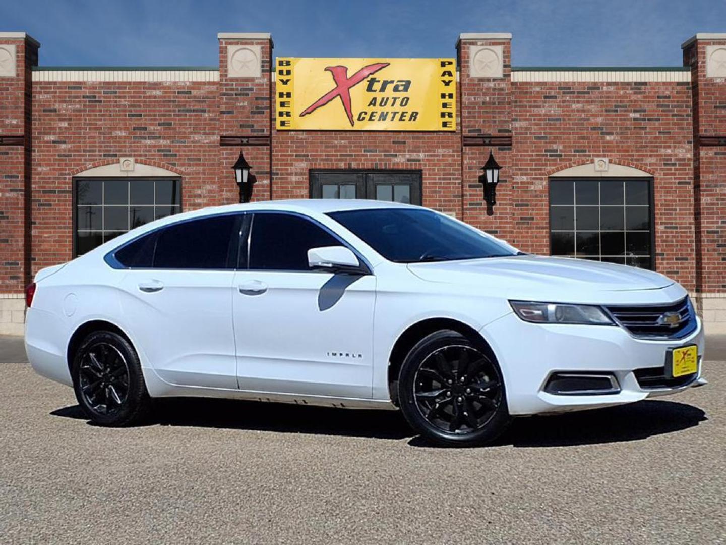2016 Summit White Chevrolet Impala LT (2G1115S3XG9) with an 3.6L 3.6L Flex Fuel V6 305hp 264ft. lbs. Direct Injection engine, 6-Speed Shiftable Automatic w/Overdrive transmission, located at 1401 N. Hobart, Pampa, TX, 79065, (806) 665-9872, 35.549953, -100.975098 - Photo#0