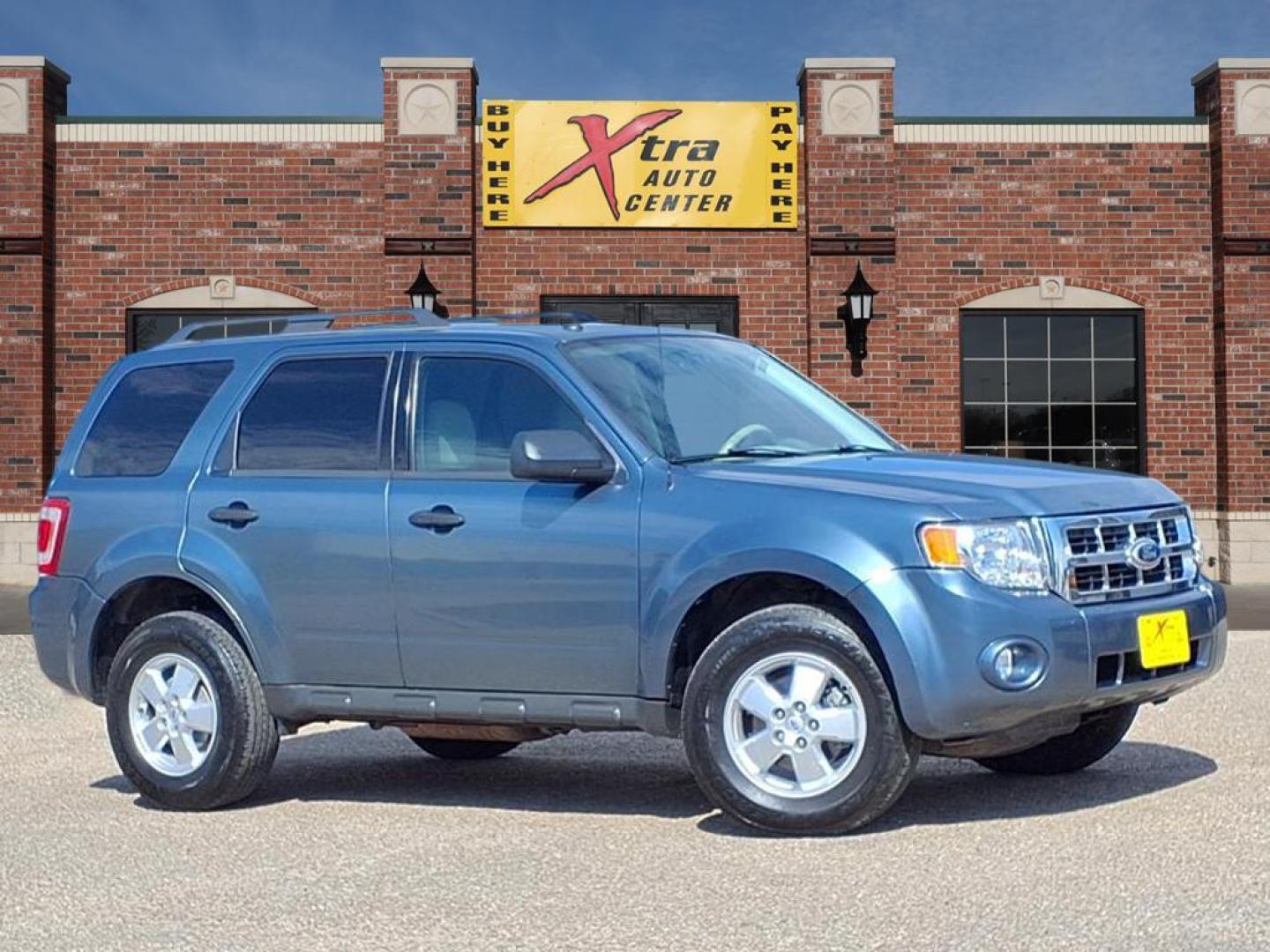 2011 Steel Blue Metallic Ford Escape XLT (1FMCU0DG1BK) with an 3.0L 3.0L Flex Fuel V6 240hp 223ft. lbs. Sequential Multiport Fuel Injection engine, 6-Speed Automatic transmission, located at 1401 N. Hobart, Pampa, TX, 79065, (806) 665-9872, 35.549953, -100.975098 - Photo#0
