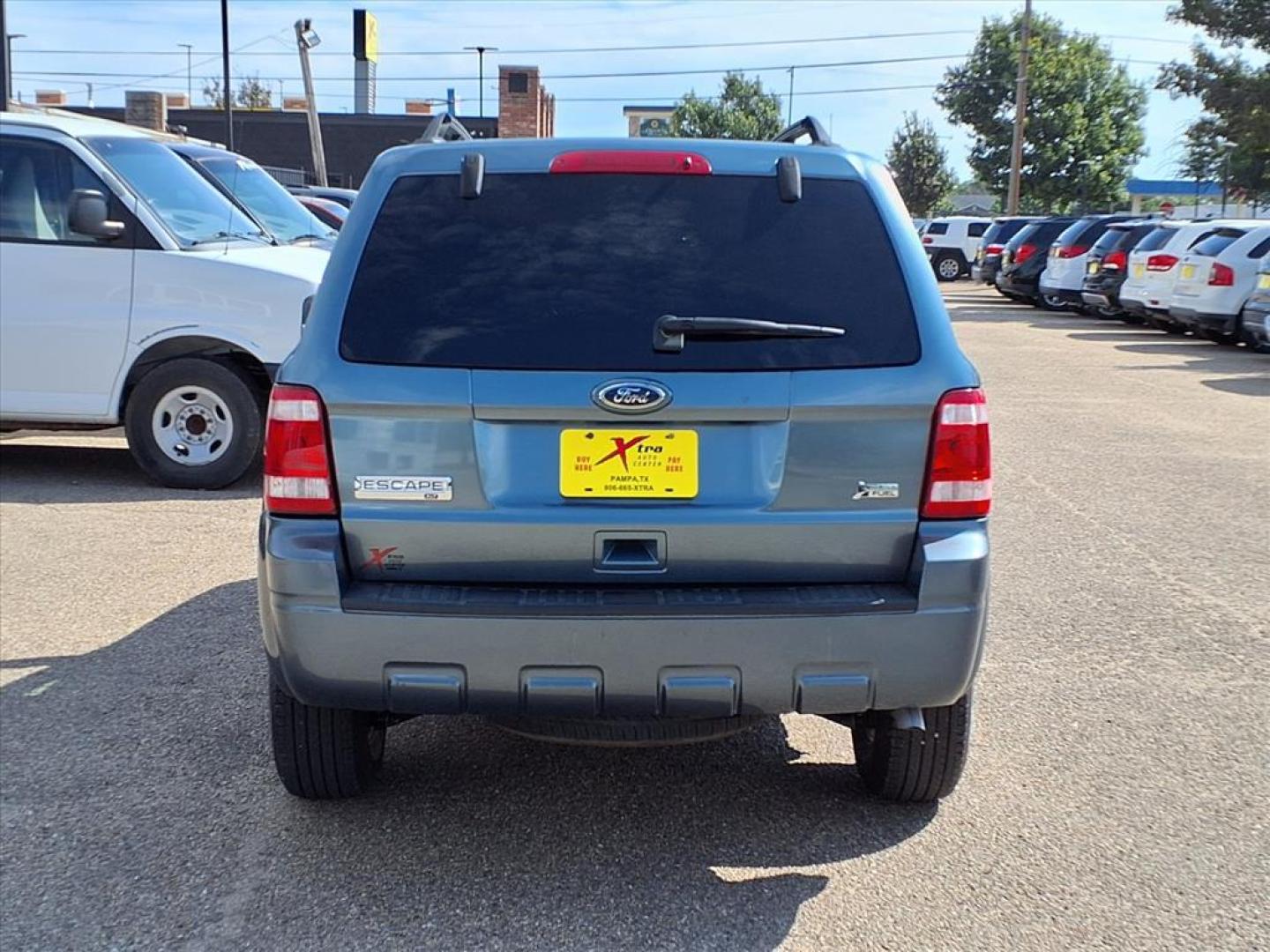 2011 Steel Blue Metallic Ford Escape XLT (1FMCU0DG1BK) with an 3.0L 3.0L Flex Fuel V6 240hp 223ft. lbs. Sequential Multiport Fuel Injection engine, 6-Speed Automatic transmission, located at 1401 N. Hobart, Pampa, TX, 79065, (806) 665-9872, 35.549953, -100.975098 - Photo#3