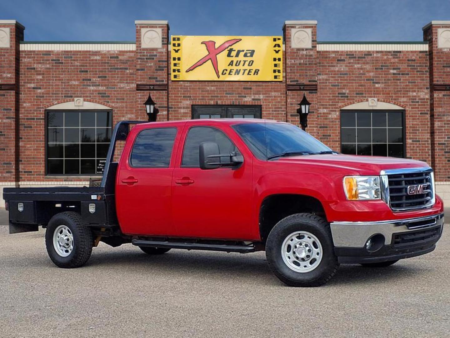 2007 Fire Red GMC Sierra 2500HD SLT (1GTHK23687F) with an 6.6L Duramax 6.6L Turbo Diesel V8 365hp 660ft. lbs. Direct Injection engine, 6-Speed Shiftable Automatic transmission, located at 1401 N. Hobart, Pampa, TX, 79065, (806) 665-9872, 35.549953, -100.975098 - Photo#0