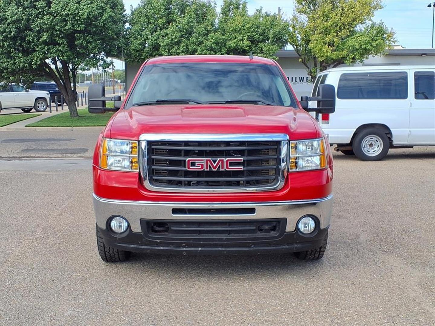 2007 Fire Red GMC Sierra 2500HD SLT (1GTHK23687F) with an 6.6L Duramax 6.6L Turbo Diesel V8 365hp 660ft. lbs. Direct Injection engine, 6-Speed Shiftable Automatic transmission, located at 1401 N. Hobart, Pampa, TX, 79065, (806) 665-9872, 35.549953, -100.975098 - Photo#1