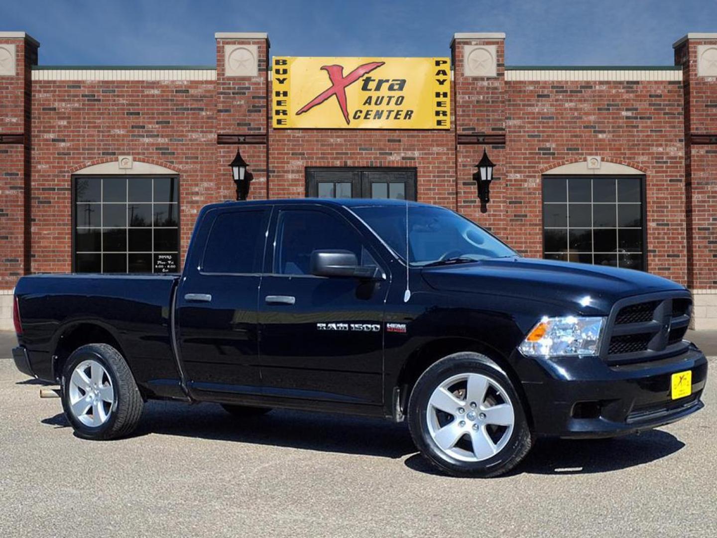 2012 Black Clear Coat Dodge 1500 ST Quad Cab 2WD (1C6RD6FT5CS) with an Other engine, Automatic transmission, located at 1401 N. Hobart, Pampa, TX, 79065, (806) 665-9872, 35.549953, -100.975098 - Are you ready to elevate your adventures and take on life's challenges with confidence? Whether you're commuting to work, heading out for a weekend getaway, or tackling a DIY project, the 2012 Dodge Ram 1500 is the perfect companion for your active lifestyle. With a robust 5.7L V8 engine and rear-wh - Photo#0