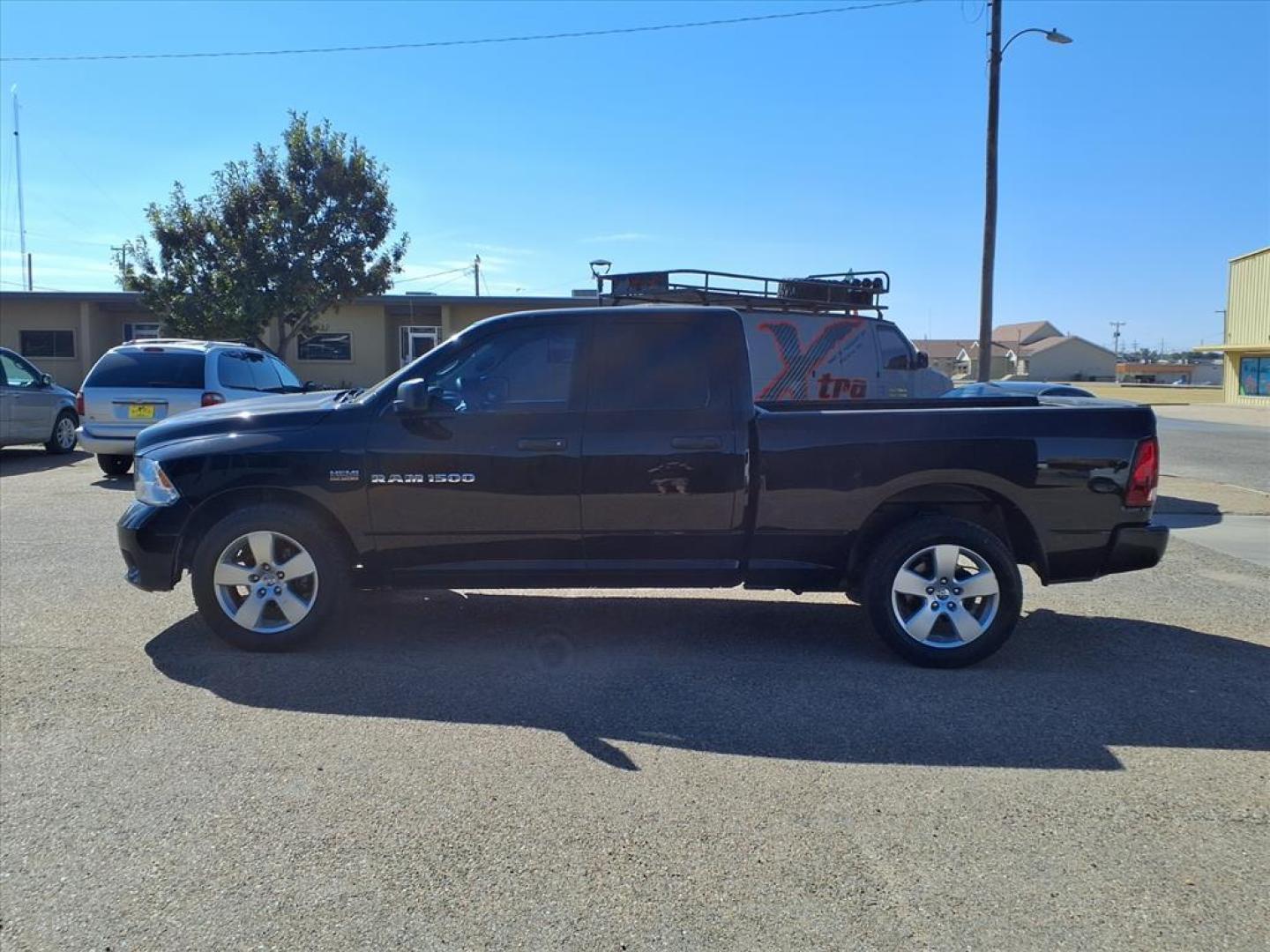2012 Black Clear Coat Dodge 1500 ST Quad Cab 2WD (1C6RD6FT5CS) with an Other engine, Automatic transmission, located at 1401 N. Hobart, Pampa, TX, 79065, (806) 665-9872, 35.549953, -100.975098 - Are you ready to elevate your adventures and take on life's challenges with confidence? Whether you're commuting to work, heading out for a weekend getaway, or tackling a DIY project, the 2012 Dodge Ram 1500 is the perfect companion for your active lifestyle. With a robust 5.7L V8 engine and rear-wh - Photo#4