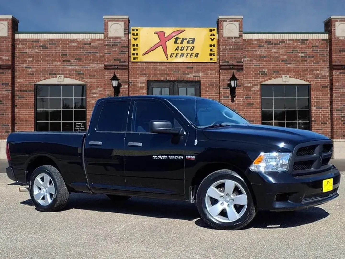 2012 Black Clear Coat Ram 1500 ST Quad Cab 2WD (1C6RD6FT5CS) with an Other engine, located at 1401 N. Hobart, Pampa, TX, 79065, (806) 665-9872, 35.549953, -100.975098 - Are you ready to elevate your adventures and take on life's challenges with confidence? Whether you're commuting to work, heading out for a weekend getaway, or tackling a DIY project, the 2012 Dodge Ram 1500 is the perfect companion for your active lifestyle. With a robust 5.7L V8 engine and rear-wh - Photo#0