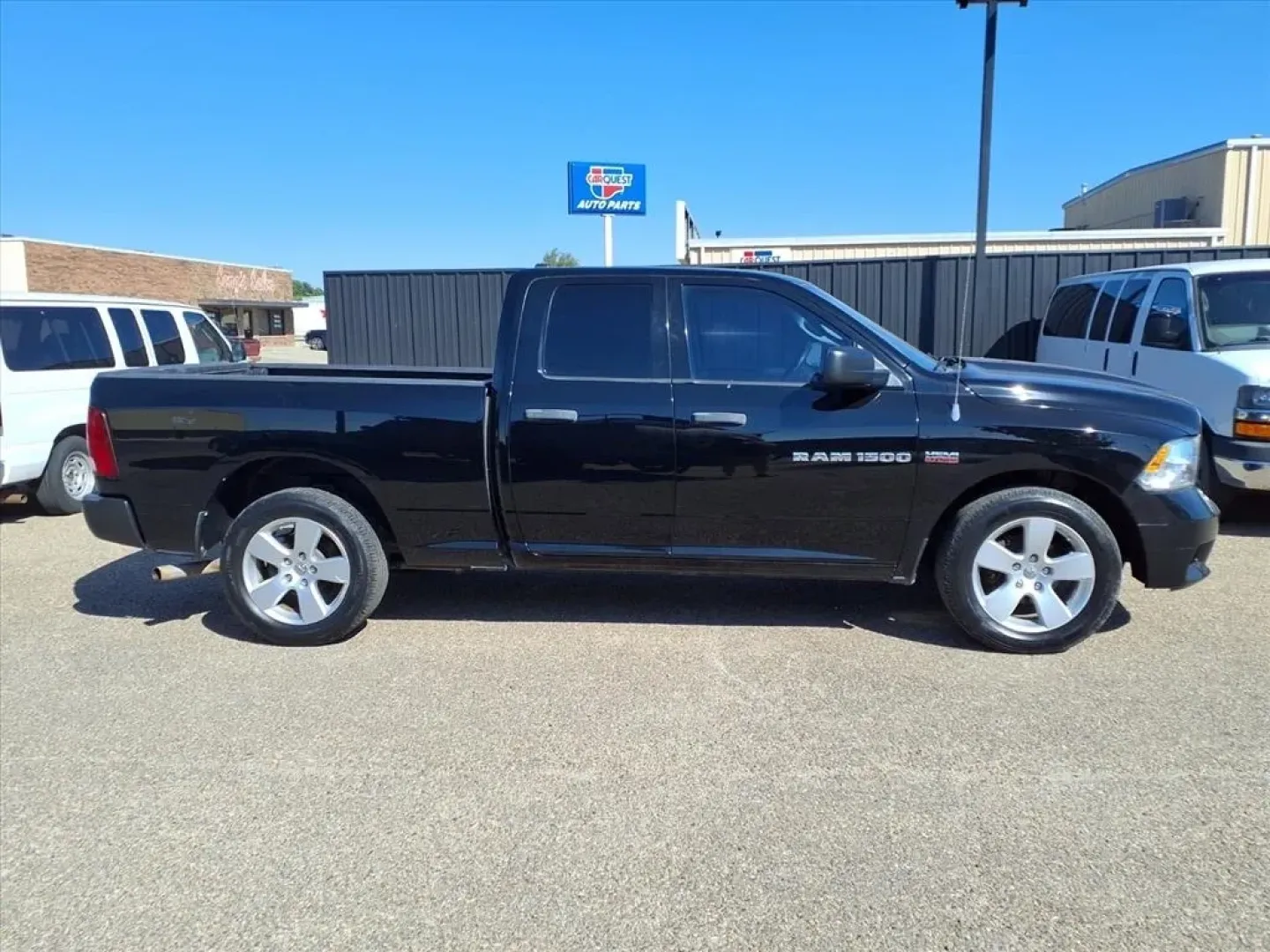 2012 Black Clear Coat Ram 1500 ST Quad Cab 2WD (1C6RD6FT5CS) with an Other engine, located at 1401 N. Hobart, Pampa, TX, 79065, (806) 665-9872, 35.549953, -100.975098 - Are you ready to elevate your adventures and take on life's challenges with confidence? Whether you're commuting to work, heading out for a weekend getaway, or tackling a DIY project, the 2012 Dodge Ram 1500 is the perfect companion for your active lifestyle. With a robust 5.7L V8 engine and rear-wh - Photo#2